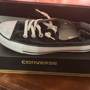 Black velvet converse slip ons.  Cute just too narrow for me worn once. Like new